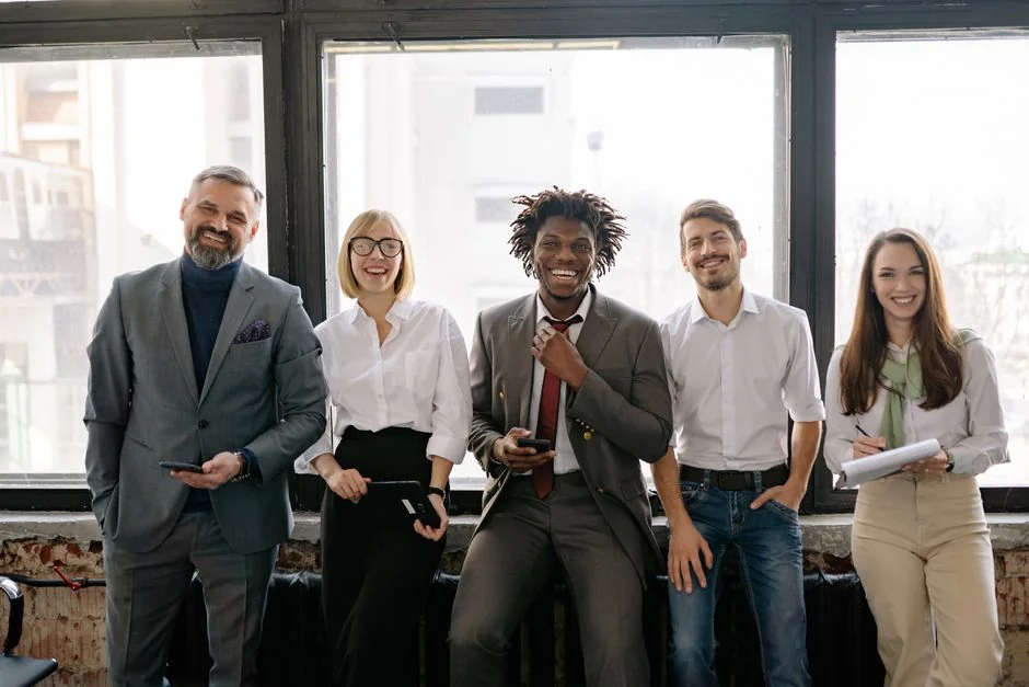 Group of business professionals collaborating in an office setting.